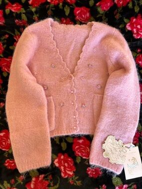 LaceMade “Acacia” Pink Wool-Blend Cardigan with Satin Rose Details 
Size: M 
NWT